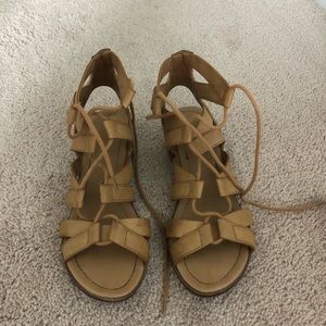 Cross up heeled sandals